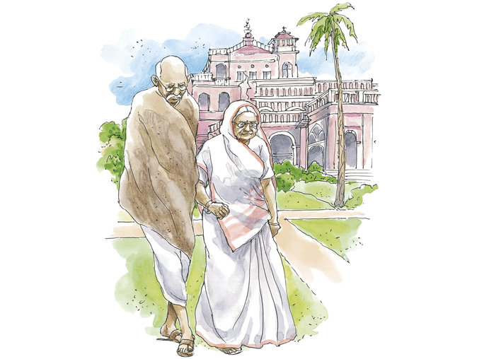 Kasturba and Mahatma Gandhi walking together