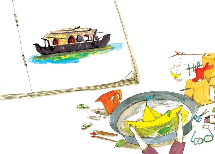 A child looking at a picture of a house boat
